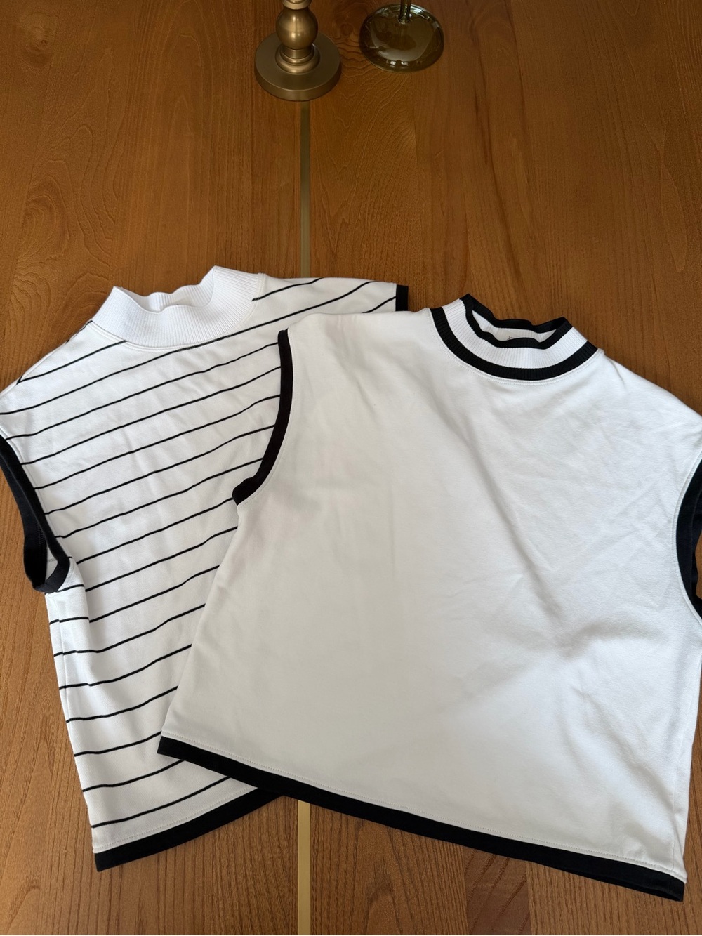 Two Women's White Muscle Tee Set with Black Trim and one with stripes  XS